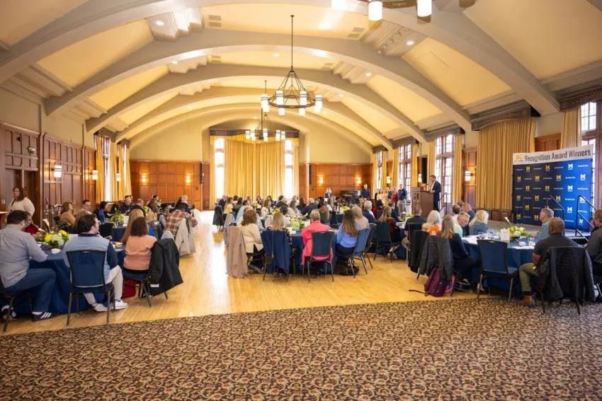 Zoomed out image of the ballroom with all the award recipients